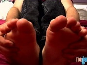 Horny young man Seth Efron shows off feet while jerking off
