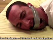 Victor SockGagged and TapeGagged tight and captured with socks inside his mouth wrapped the tape around his head PREVIEW